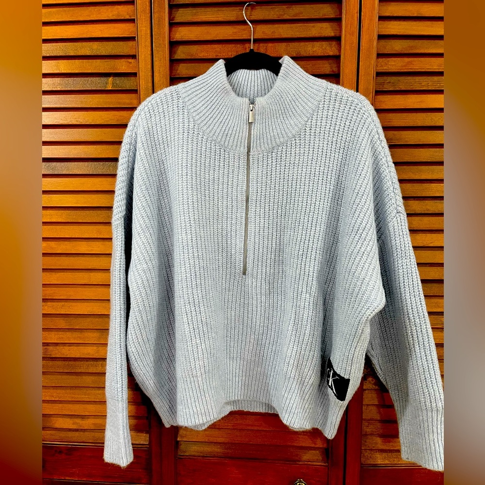 Light blue knit half zip sweater